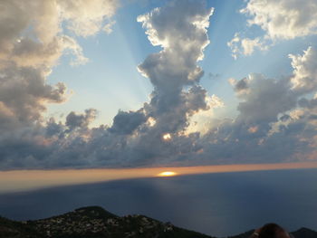 Scenic view of sea against sky at sunset