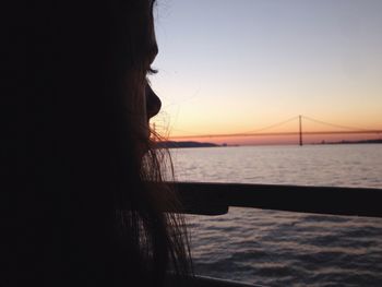 Scenic view of sea against clear sky during sunset