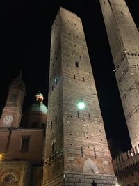 Low angle view of illuminated building at night