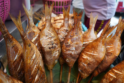 Close-up of smoked fish for sale in market