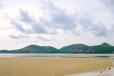 Scenic view of beach against sky