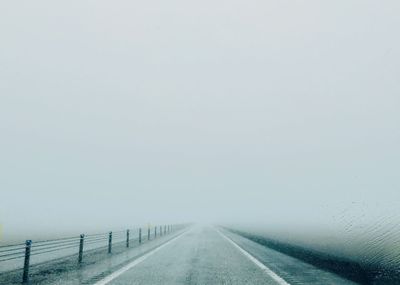 Road against sky during winter, iceland