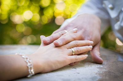 Close-up of couple hands