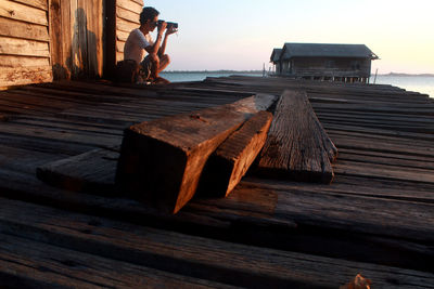 View of wooden pier on sea