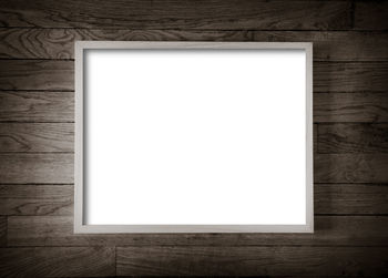 View of wooden floor against wall
