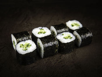 Close-up of sushi served on table