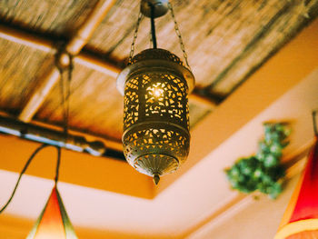 Low angle view of illuminated ceiling