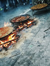 High angle view of bonfire on barbecue grill