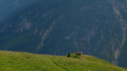 Scenic view of land against mountains