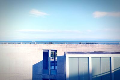 Scenic view of sea against blue sky