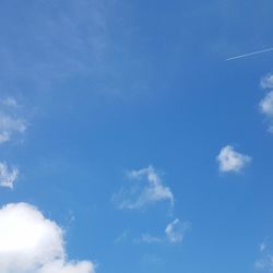 Low angle view of vapor trail in sky