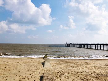 Scenic view of beach against sky