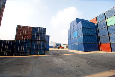 Row of stacking containers of freight import/export shipping logistics transport industrial