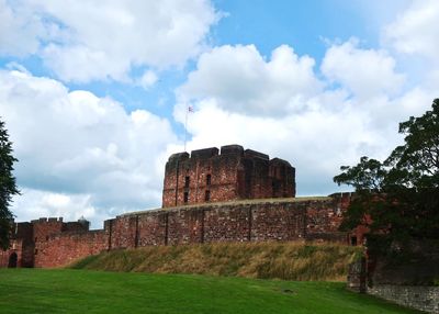 Old ruin building against cloudy sky