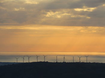 Scenic view of landscape against sky during sunset