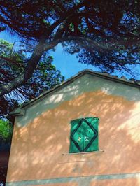 Low angle view of built structure against blue sky