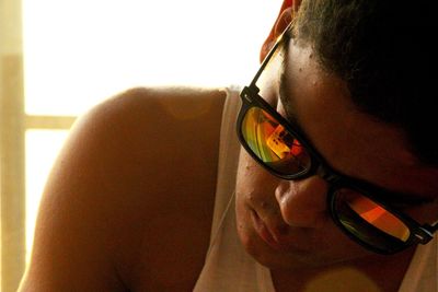 Close-up of boy wearing sunglasses