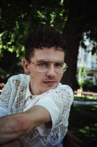 Portrait of young man wearing eyeglasses