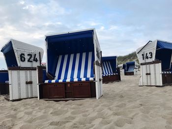 Hooded chairs on beach