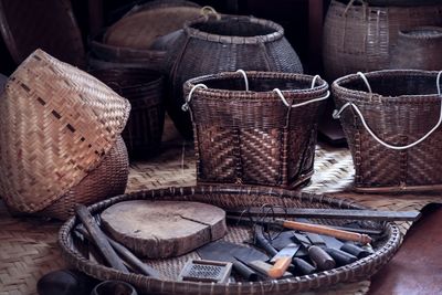 High angle view of knives in basket at market stall