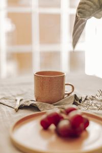 Close-up of coffee cup on table