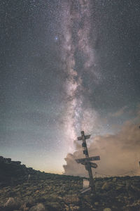 Scenic view of landscape against sky at night