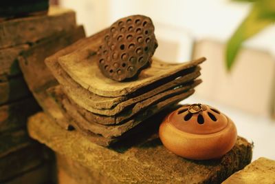 Lotus pod on tiles by container