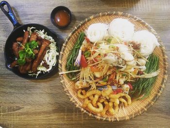 High angle view of fruits in plate on table