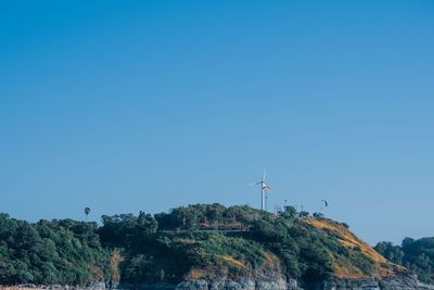 Scenic view of mountain against clear blue sky