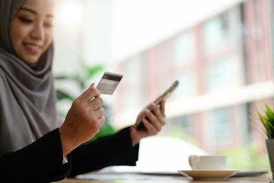 Young woman using mobile phone