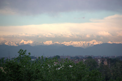 Aerial view of townscape against sky