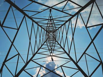 Low angle view of metal structure against sky