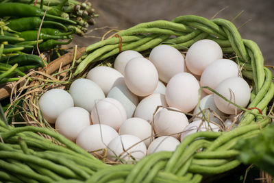 Close-up of eggs and green vegetables