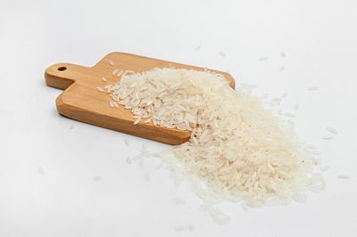 High angle view of bread on table against white background