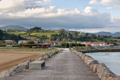 Buildings with mountain range in background