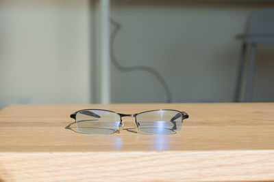 Close-up of sunglasses on table