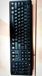 High angle view of computer keyboard on table