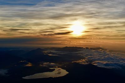 Scenic view of mountains against sky during sunset