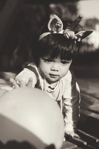 Portrait of cute girl outdoors