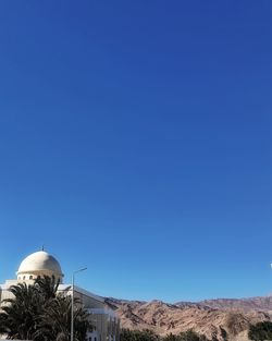 View of church against clear blue sky