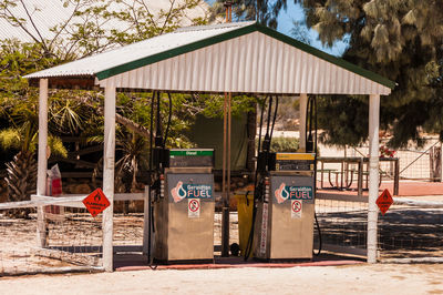 Gas station against trees