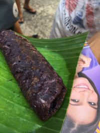 Close-up of man eating food