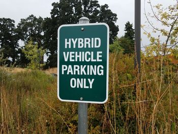 Close-up of information sign on road