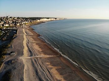 High angle view of beach against sky in city