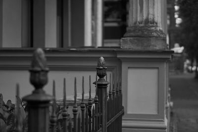 Close-up of statue against building