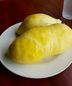 High angle view of lemon in plate on table