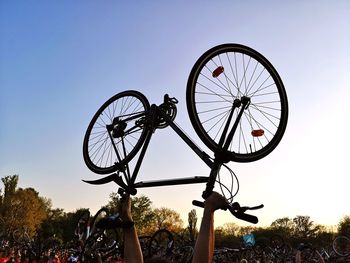 Low angle view of bicycle against clear sky