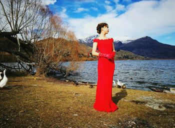 Young woman standing on landscape