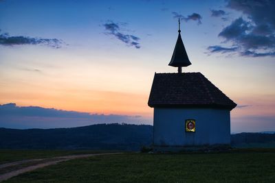 Chapel against sky during sunset