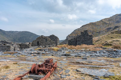 Panoramic view of rocks and mountains against sky